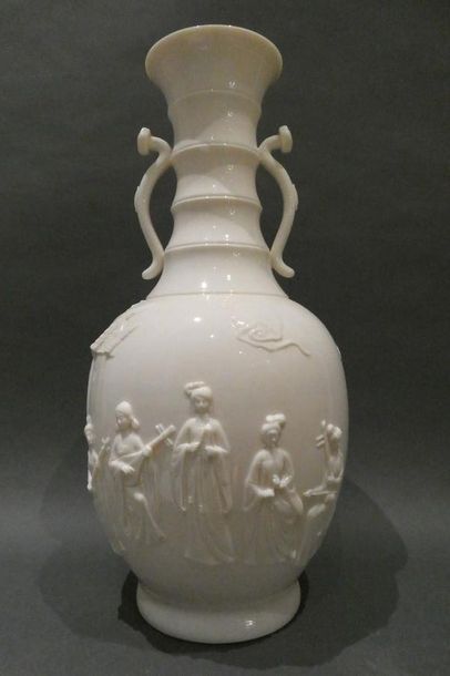 Large white opaline vase decorated with characters...