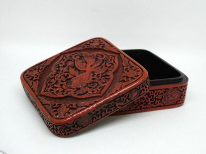 null CHINA



Carved and red lacquered square wooden box with a fish decoration on...