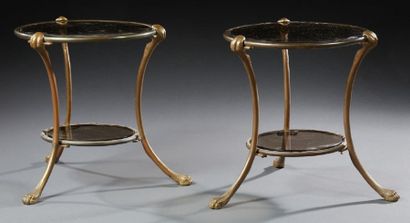 TRAVAIL FRANÇAIS 
Pair of pieces of sofa with superimposed circular glass tops resting...