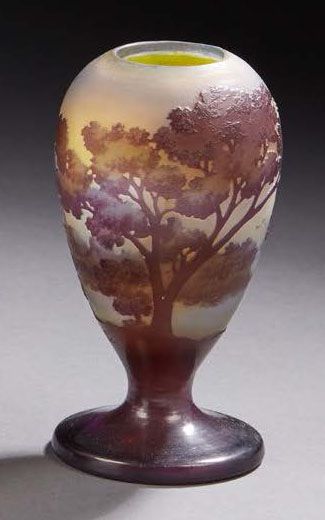 ÉTABLISSEMENTS GALLÉ 
Baluster vase on circular heel in lined glass with acid-etched...