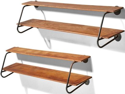 TRAVAIL 1950 
Pair of shelves with tubular structure in black lacquered metal enclosing...