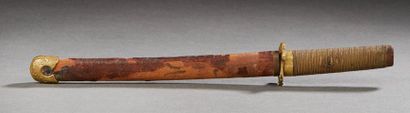 JAPON XXE SIECLE Miniature katana, the wooden sheath.
A stained ivory netsuke, frog...