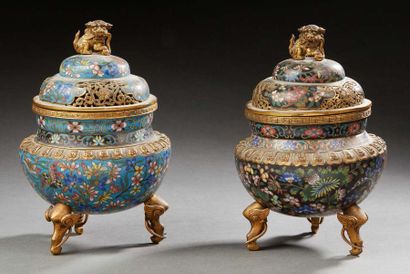CHINE vers 1900 
Two baluster burners in bronze and cloisonné enamels, one decorated...