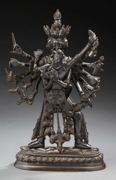 TIBET XXe SIECLE Bronze statuette with brown patina, six-armed deity in yab yum with...