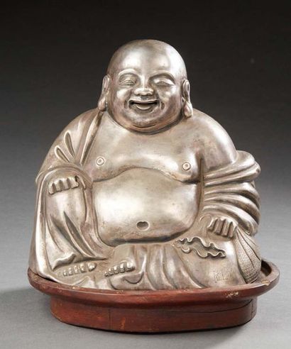 INDOCHINE VERS 1900 
Embossed silver Budai, sitting smiling on his bag of riches.
Signed...
