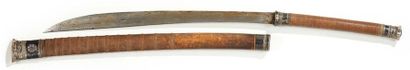 BIRMANIE vers 1900 
Sabre dha, the scabbard with wickerwork rings, the pommel and...