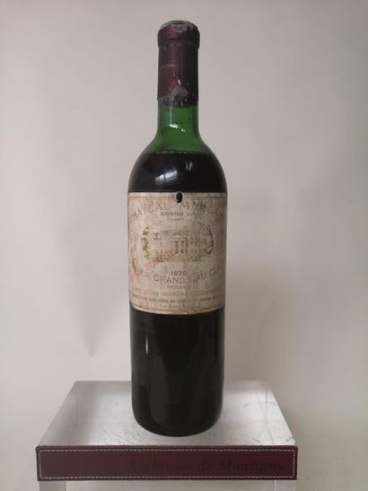 null 1 bouteille CHÂTEAU MARGAUX - 1er Gcc Margaux 1970

Etiquette tachée et griffée,...