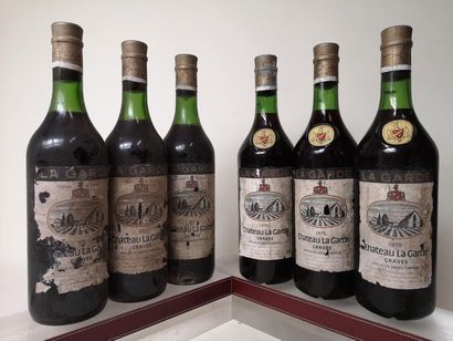 null 6 bouteilles CHÂTEAU LA GARDE - Graves 3 bouteilles de 1975 et 3 de 1978 A VENDRE...