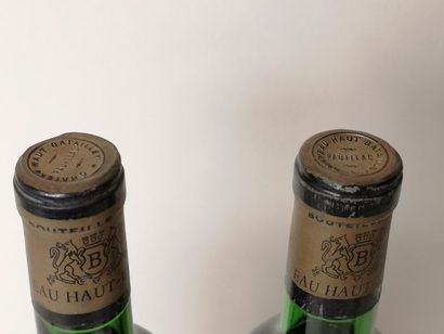 null 2 bouteilles CHÂTEAU HAUT-BATAILLEY - 5é Gcc Pauillac 1969

Etiquettes tachées...