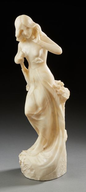 null SUJET en albatre figurant une femme drappée jouant du luth.
H. : 47,5 cm
(a...