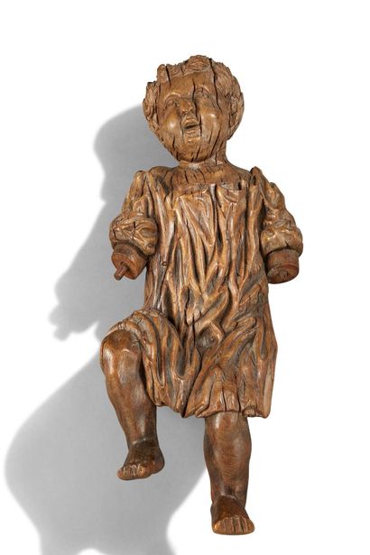 null STATUETTE en hêtre sculpté représentant l'Enfant Jésus.
XVIIIe siècle.
H. :...