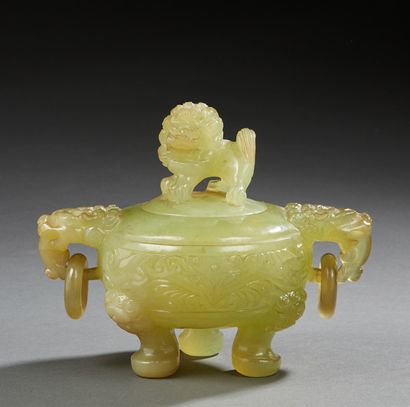 CHINE Tripod perfume burner covered in green hard stone; the ring handles show the...