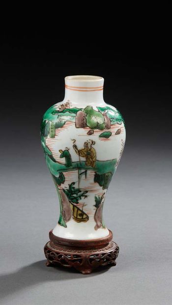 CHINE Small baluster-shaped porcelain vase, decorated in enamels of the green family...
