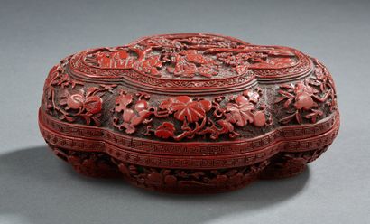 CHINE Covered box made of material imitating red lacquer decorated with characters...