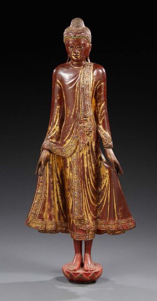 THAÏLANDE Large Buddha in lacquered and gilded wood.
20th century.
H.: 130 cm
(accidents...