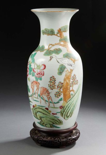 CHINE Porcelain baluster-shaped vase, decorated in rose family enamels, of two fallow...
