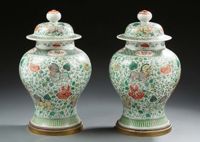 CHINE Pair of covered porcelain vases in baluster form, decorated in enamels of the...