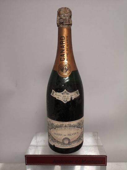null 1 bouteille CHAMPAGNE CANARD DUCHENE "Blanc de blancs" 1948


Etiquette lég....