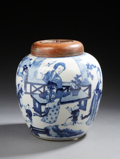 CHINE A porcelain ginger pot decorated in blue underglaze with women and children...