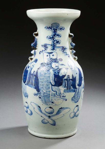 CHINE Porcelain baluster vase decorated with four characters in blue on a celadon...