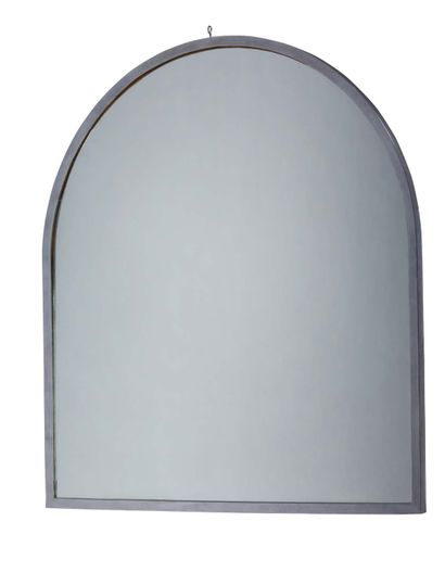 TRAVAIL 1930 
Miroir à encadrement arrondi en métal nickelé
Dim. : 120 x 105 cm