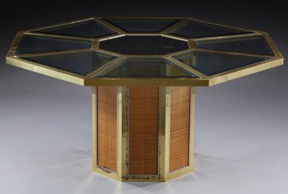 Romeo REGA (1904-1968) 
Table de salle à manger à structure en laiton et métal chromé...