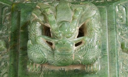 CHINE 
Spinash jade covered perfume burner of quadrangular shape resting on four...