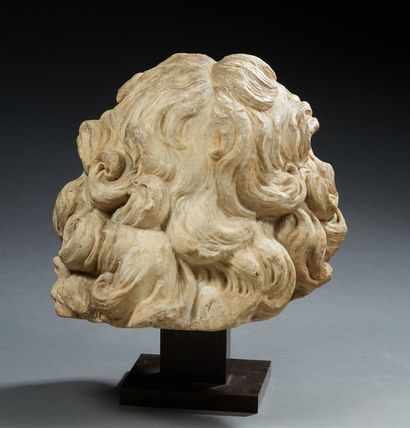 null HEAD OF A MAN in marble sculpted in the round; hair with strongly wavy strands...