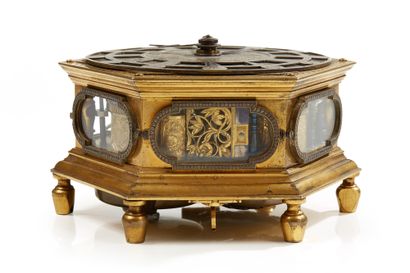 null RARE table clock in bronze or engraved brass, gilt or silvered; the dial with...