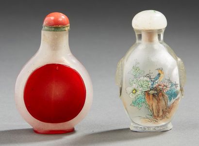 CHINE Two snuff bottles, one in glass painted with a landscape, the other in two...