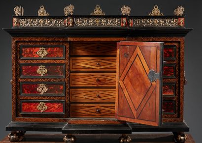 null CABINET MARQUETED with red tinted tortoiseshell and rosewood with boxwood fillets;...