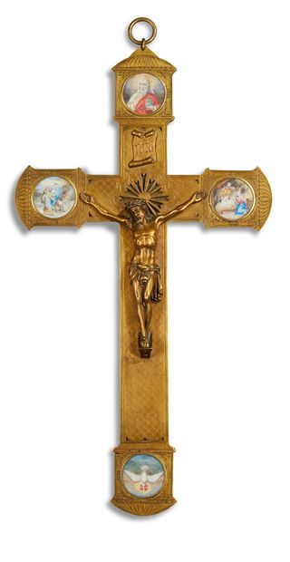 null CROSS in chased, engraved, pierced and gilded brass; Christ is shown with his...