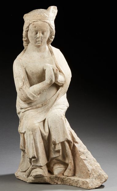 null VIRGIN OF THE ANNOUNCEMENT in sculpted limestone. 
 Seated on a bench, Mary...