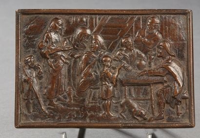 null A bronze PLATE decorated with an inn scene
Flanders, 17th century H. 6.7 - L....