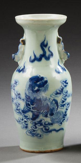 CHINE Small baluster vase decorated with a blue chiler on a celadon background.
End...