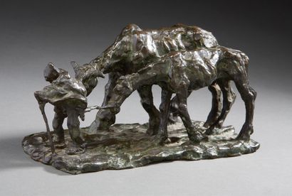 Gaston BROQUET (1880-1947) Vieil homme tirant deux chevaux.
Groupe en bronze à patine...