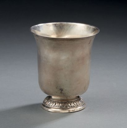null * A silver TIMBALE standing on a pedestal decorated with a frieze of ovals,...
