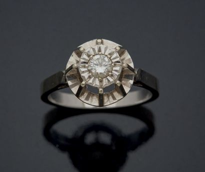 null BAGUE SOLITAIRE en or gris 750 mm ornée d'un petit diamant de taille moderne...