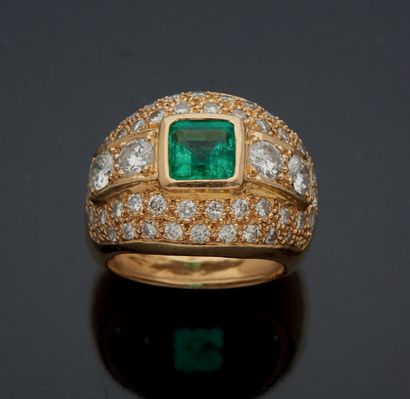 null Yellow gold 750 mm BALL RING set with an emerald-cut emerald weighing approximately...