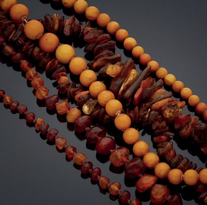 null SET of three necklaces, one in rough amber, one in reworked amber and one in...