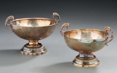 null TWO silver wedding cups. The handles showing ram heads.
Engraved inscription:...