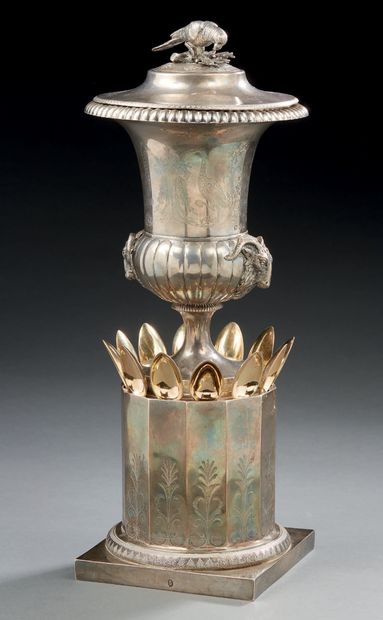  RARE silver JUGGING BOTTLE, it rests in lower part on a column with cut sides chiselled...