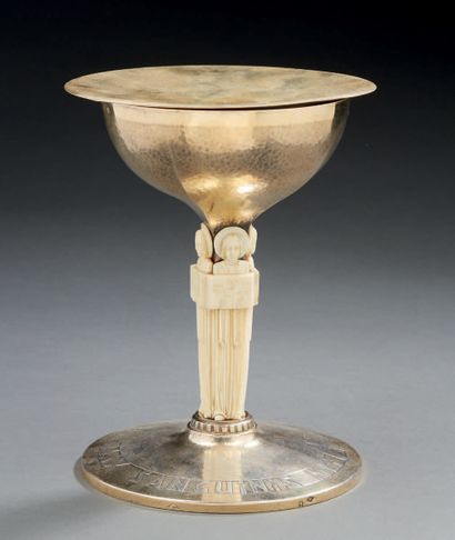 null CALICE AND ITS PATEN in hammered vermeil, the shaft with square section, decorated...