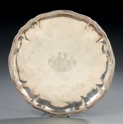 null ROUND AND HALF-CIRCULAR PLAT in silver, model with filets and contours, the...