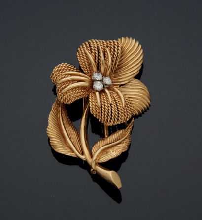 null 750 mm yellow gold and platinum pansy brooch, centered with a pistil set with...