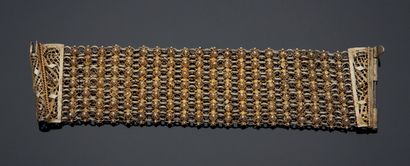null Ethnic style silver chased, filigree and partially gilded BRACELET.
Gross weight:...