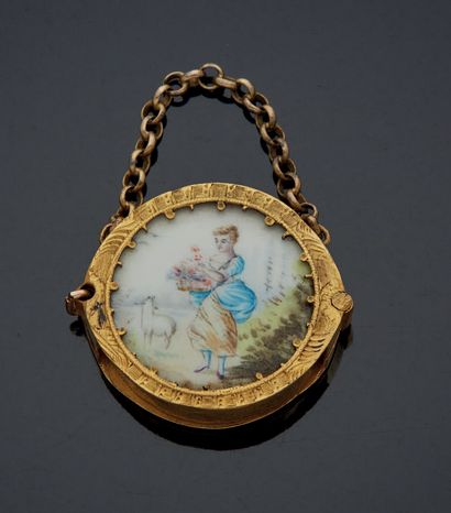  SMALL MEDAL in metal decorated on one side with an enamel representing a shepherdess...