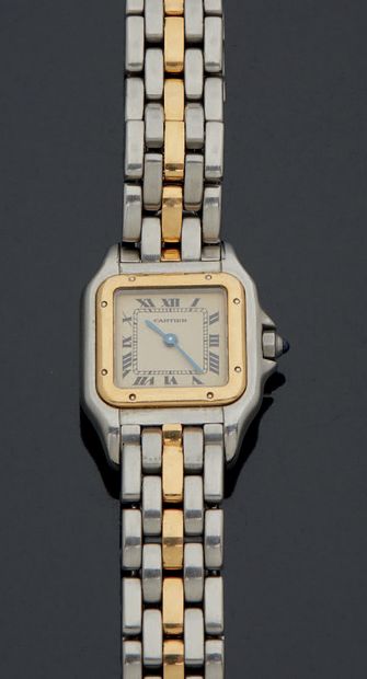 CARTIER, Paris. Modèle Santos-Dumont.
MONTRE-BRACELET de dame en or et acier, cadran...