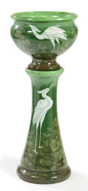 Delphin MASSIER (1836-1907) Important vase en céramique émaillée verte à décor d'échassier...