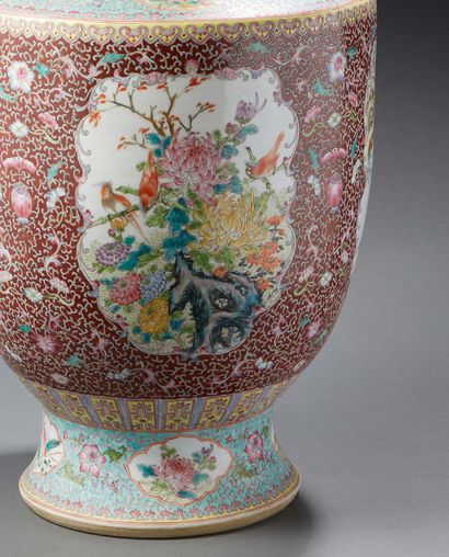 CHINE A large porcelain vase of baluster form decorated in famille rose enamels with...